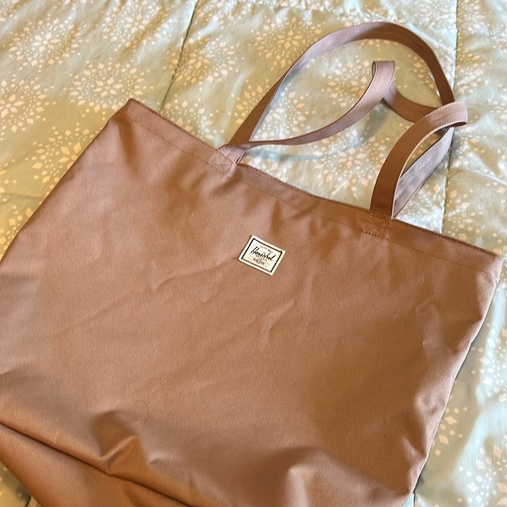 Herschel Supply co. Large bag on pale pink.